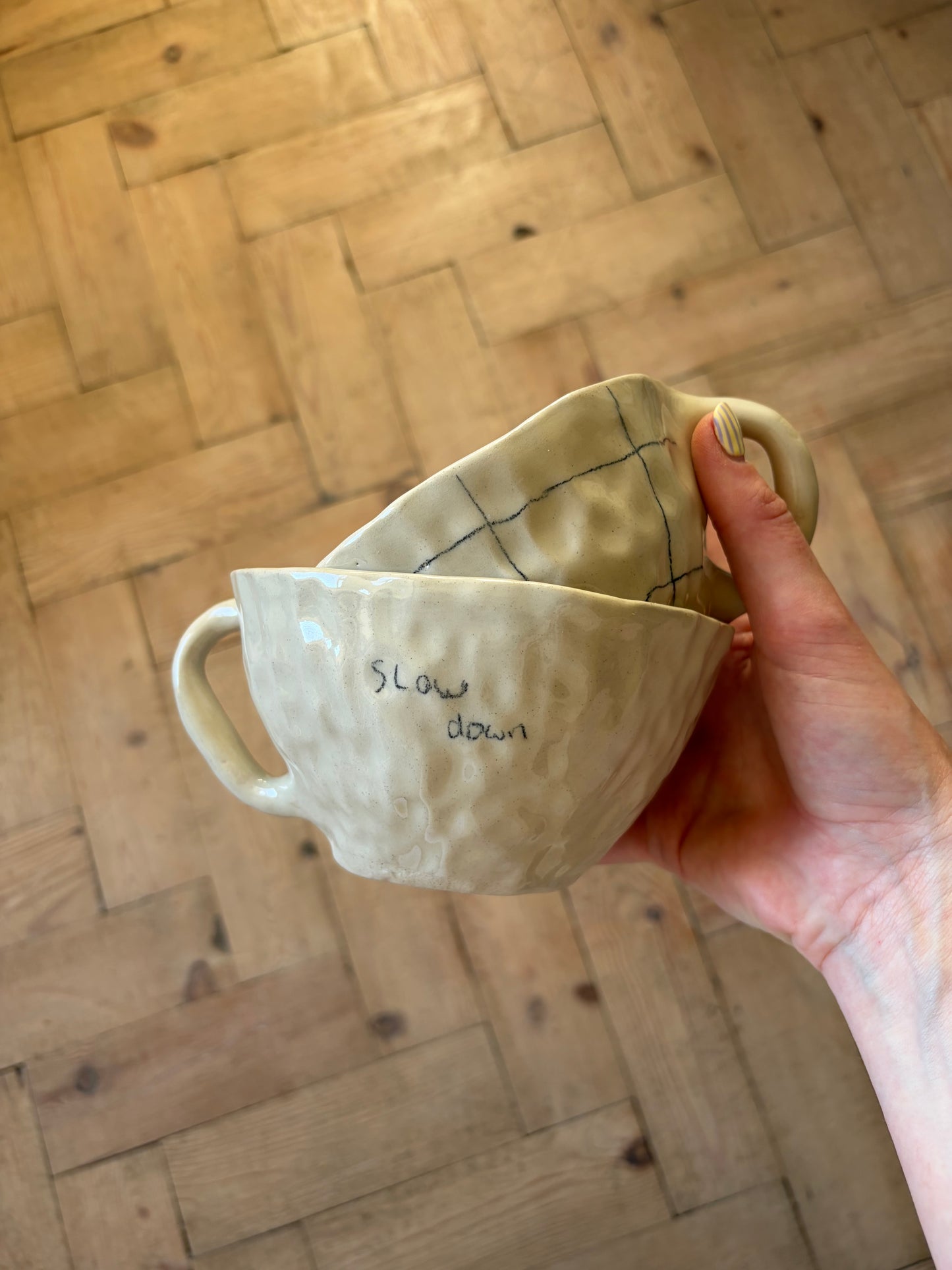 ‘Slow down’ hand written mug