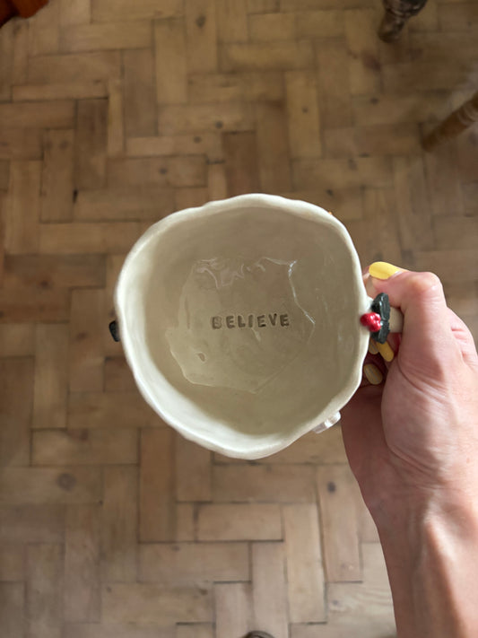 Believe Christmas mug