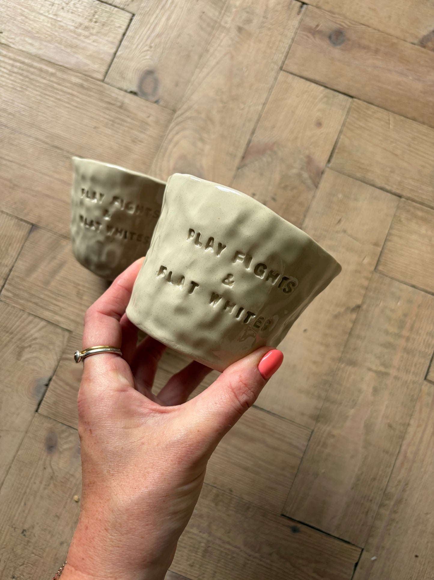 Play fights and flat whites mug