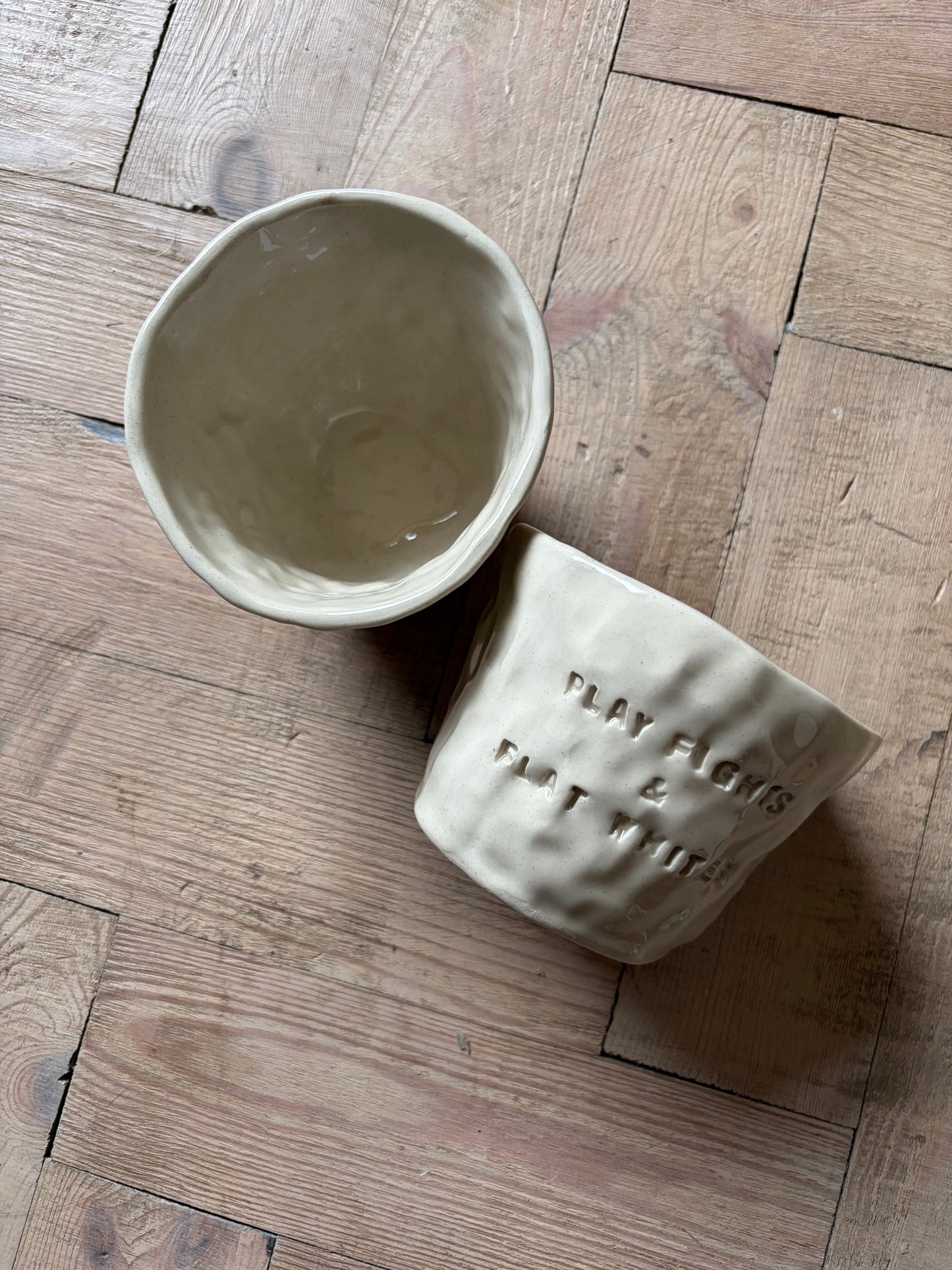 Play fights and flat whites mug