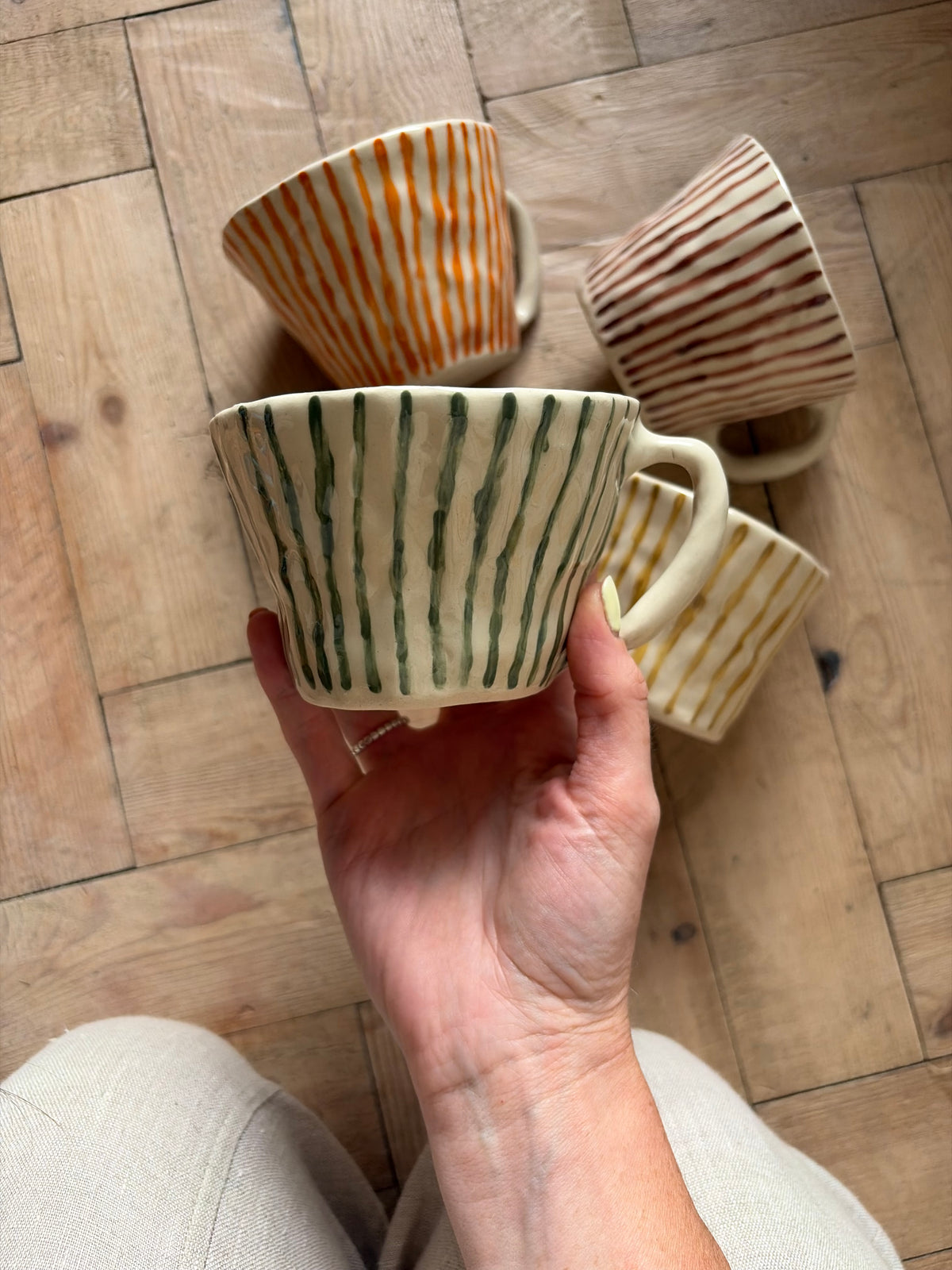 Green thin stripe mug