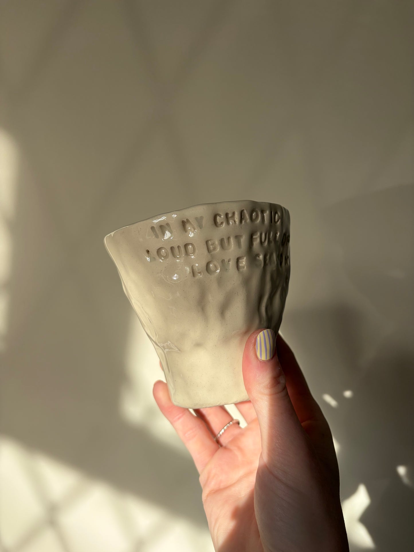 In my chaotic, loud, full of love season hand warmer mug