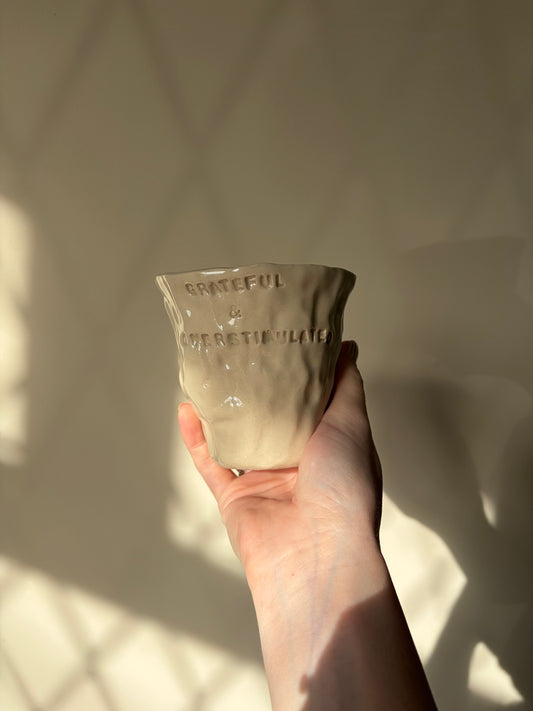 Grateful and overstimulated hand warmer mug