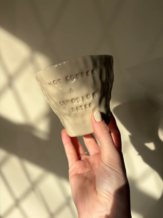 Hot coffee and dinosaur dates imperfect mug
