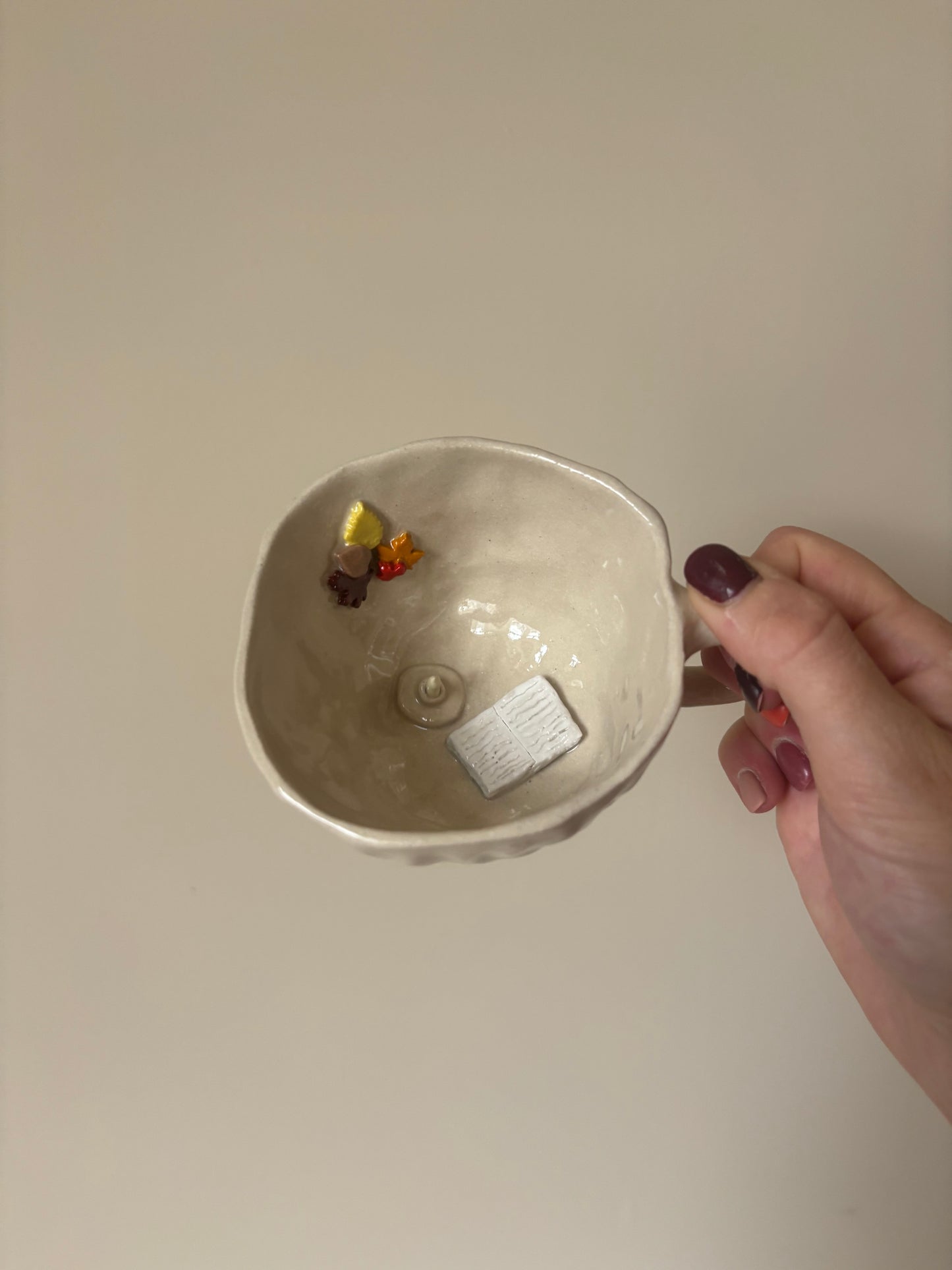 Snuggle up with a book by candle light flat white