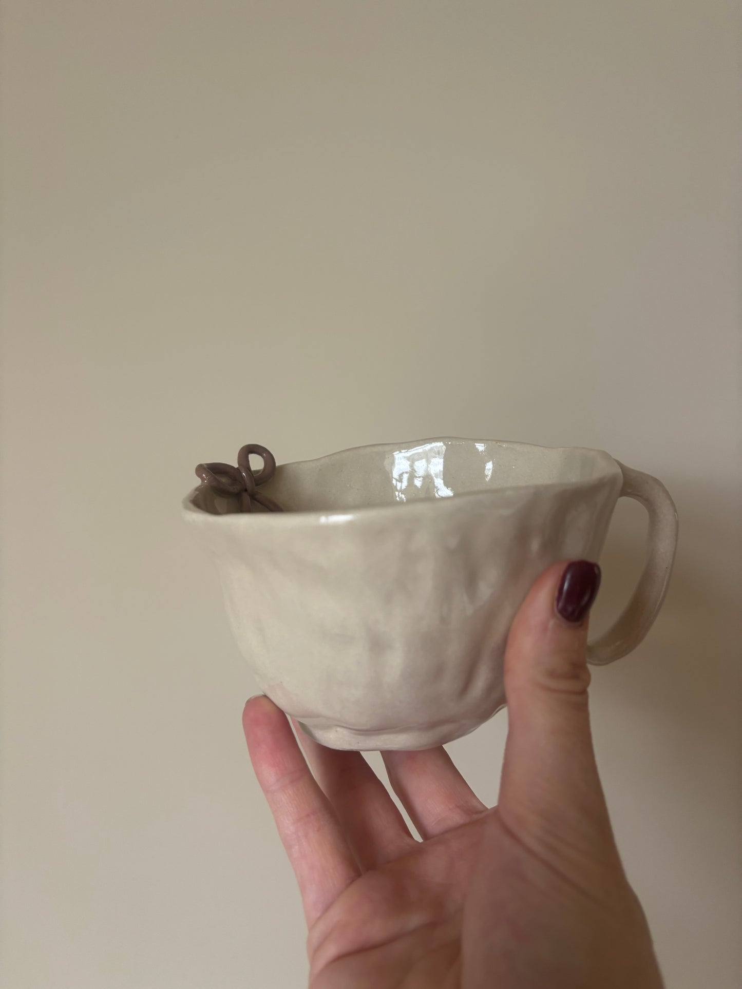 Cinnamon rolls, cinnamon sticks and bow mug