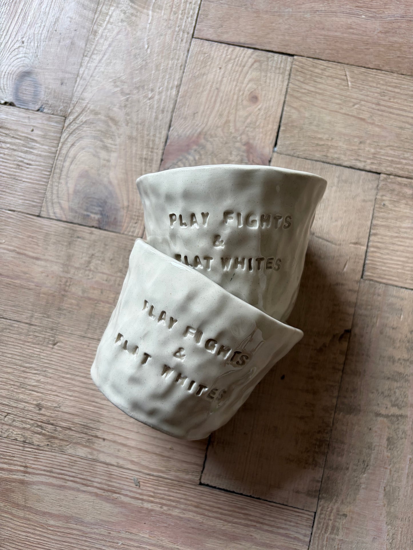 Play fights and flat whites mug