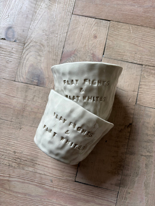 Play fights and flat whites mug
